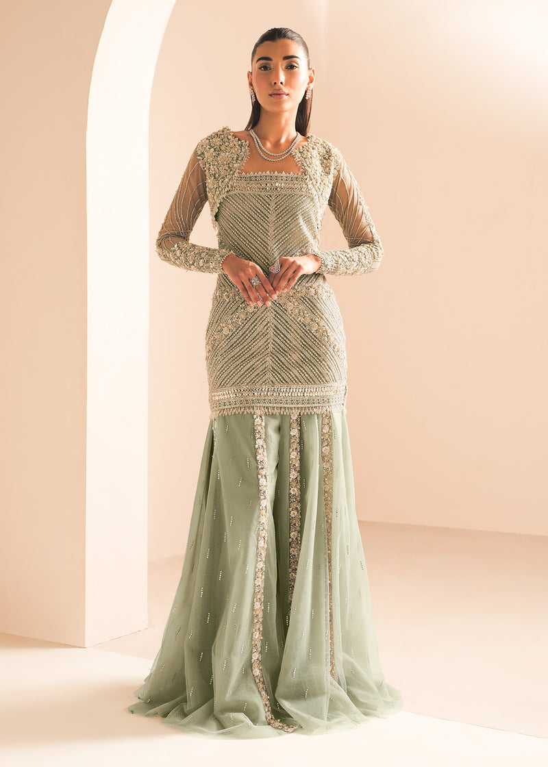 Gleam Pakistani indian bridal wedding dress mehndi nikkah suit usa uk australia canada europe Germany bridesmaid trending dresses guest luxury womens wear gift for her pakistani indian designer dreses
This artful craftsmanship is enveloped in timeless beauty with iridescent sequins, lustrous crystals &amp; glistening milky pearls. The ombre lehenga &amp; shirt stand as a divine embodiment of time-honored elegance. The exquisite 3D florets, dabka &amp; naqshi detailing impart an air of grace &amp; sophistica